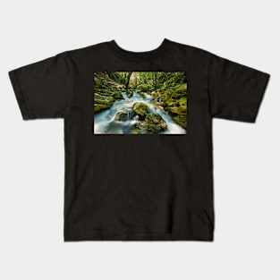 River flowing through rocks Kids T-Shirt